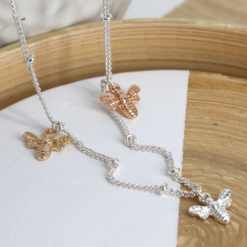 Silver plated necklace with triple mixed finish bee charms