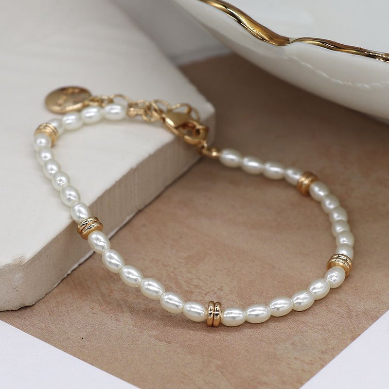 Seed pearl and gold spacer bead bracelet