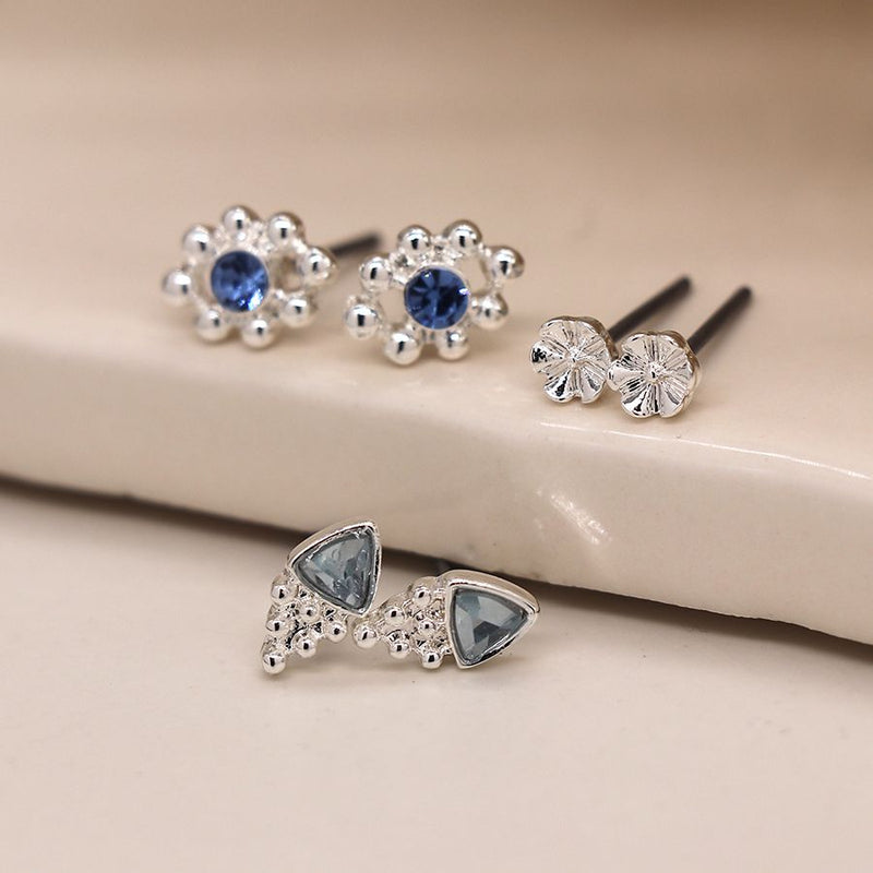 Silver plated triple stud set with blue crystal