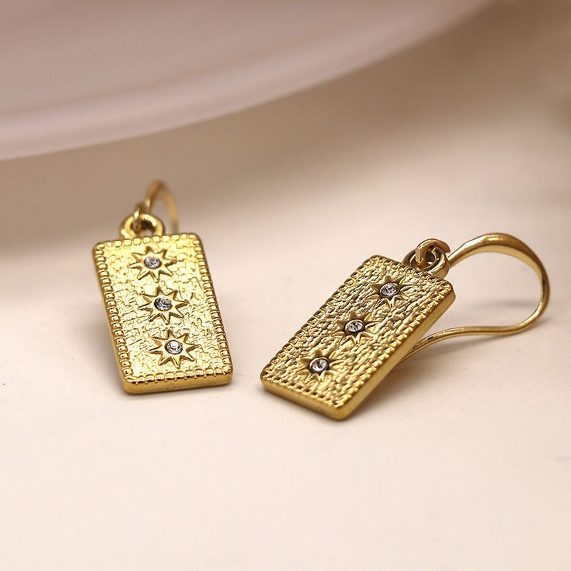 Golden embossed amulet earrings with crystals