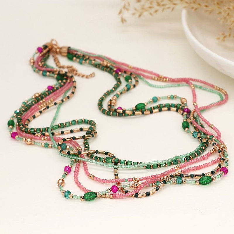 Multi strand boho bead necklace in pink, green and gold