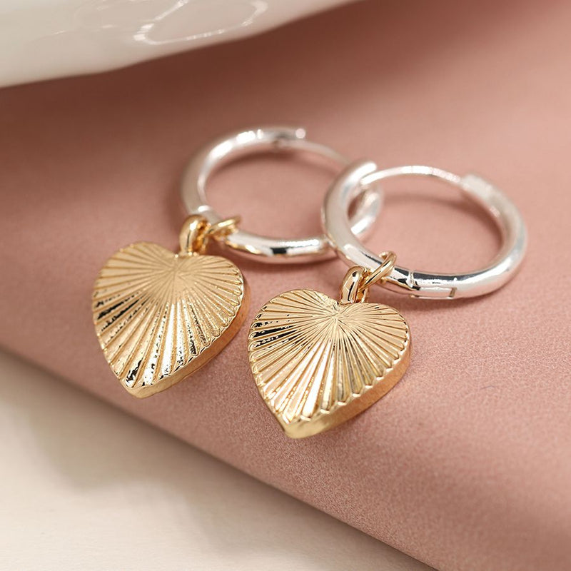Silver plated hoop and golden embossed heart earrings