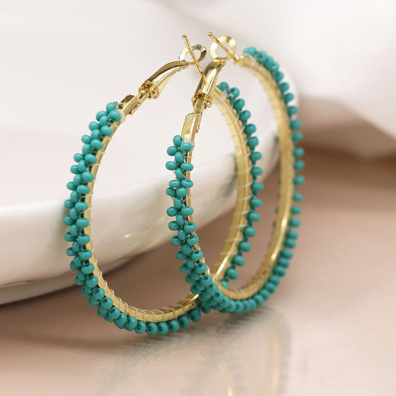 Golden and aqua bead large hoop earrings