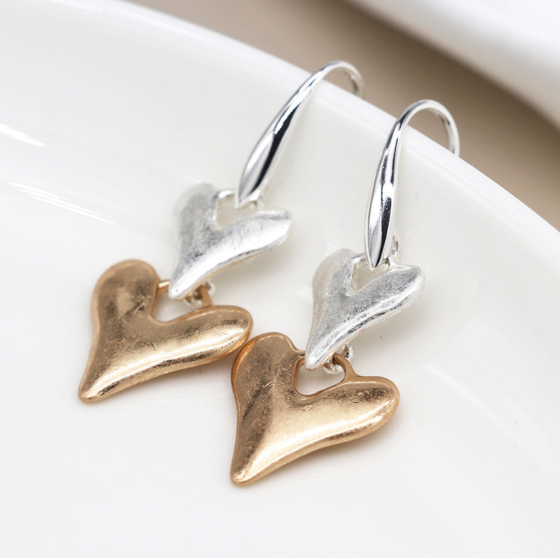 Silver plated and faux gold worn finish double heart drop earrings