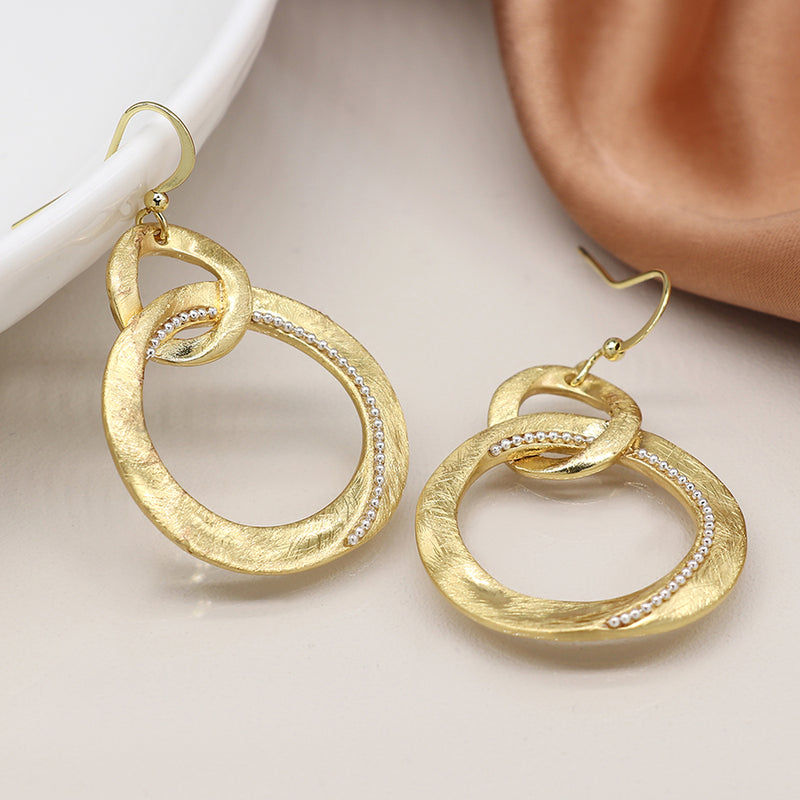 Faux gold linked organic hoop drop earrings with silver bead detail