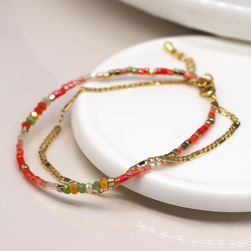 Bright Orange and Gold Plated STrand Bracelet