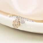 SILVER PLATED BEAD BRACELET WITH FAUX GOLD PAWPRINT AND SP HEART