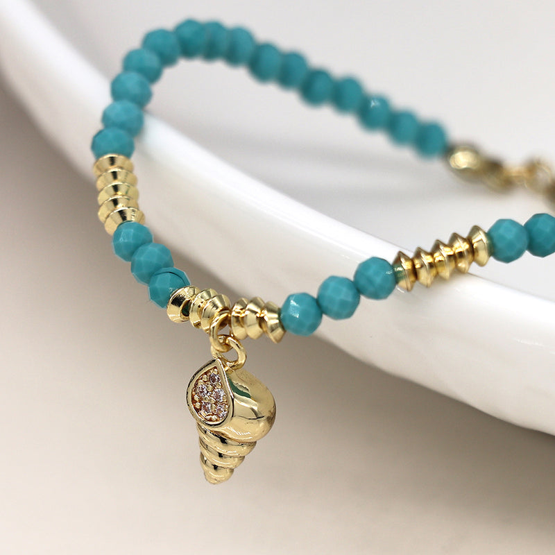Turquoise Bead and Gold Shell Fish Bracelet