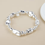 Silver plated mixed organic bead necklace