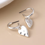 WORN SILVER BEATEN HEART DROP C POST EARRINGS