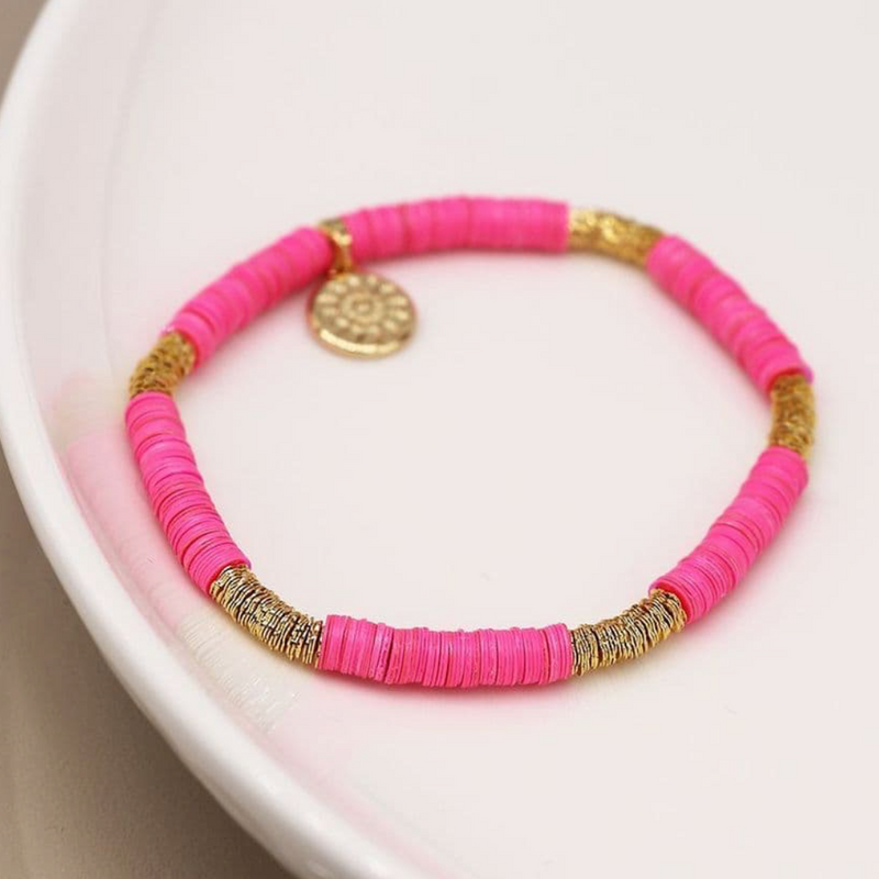 Hot pink fimo bead and pom charm bracelet