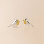 Sterling silver and gold robin stud earrings
