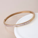 Golden pink crystals hinged bangle