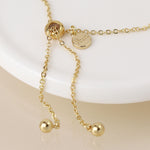 Golden crystal cylinder bracelet