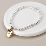 Silver plated amulet and heart charm bracelet