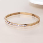 Golden pink crystals hinged bangle
