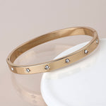 Golden crystal stars hinged bangle