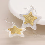 Silver plated and golden layered star earrings