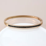 Golden black crystals hinged bangle