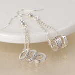 Silver plated triple crystal rings and chain earrings