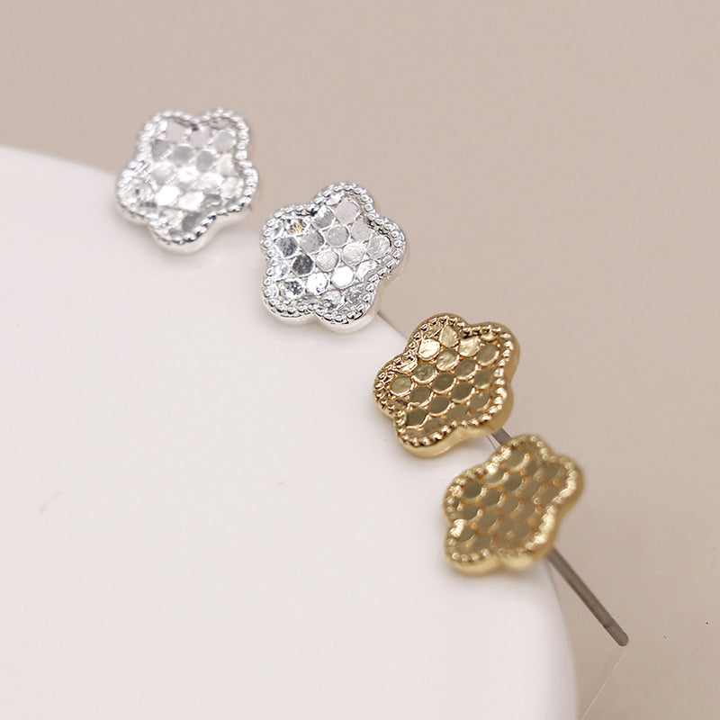 Silver plated and golden textured flower stud earrings