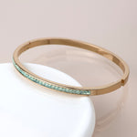 Golden green crystals hinged bangle