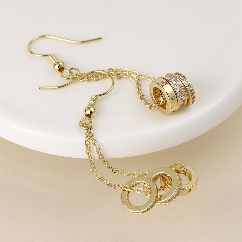 Golden triple crystal rings and chain earrings