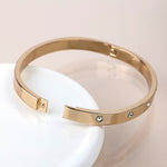 Golden crystal stars hinged bangle