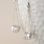 Silver plated triple crystal rings and chain earrings