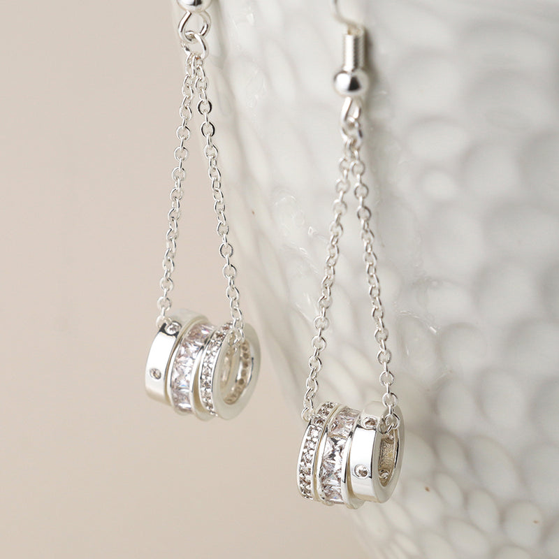 Silver plated triple crystal rings and chain earrings