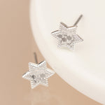Silver plated and golden textured star stud earrings