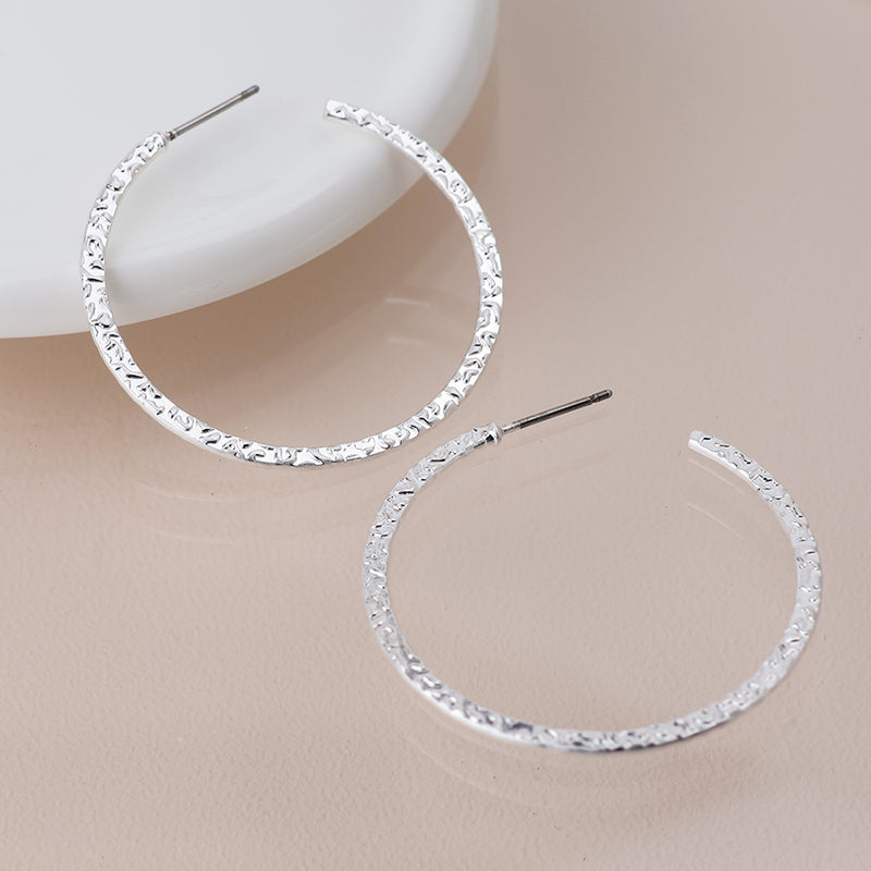 Silver plated textured hoop earrings
