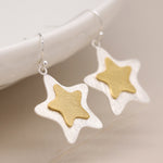Silver plated and golden layered star earrings