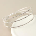 Silver plated triple strand crystal bracelet