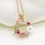 Golden shell and crystal wreath necklace