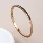 Golden black crystals hinged bangle