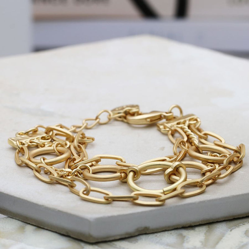 Triple strand golden mixed chain and hoops bracelet
