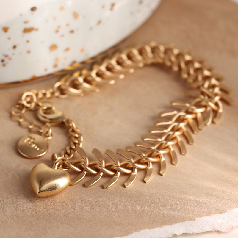Golden chevron link bracelet with brushed gold heart