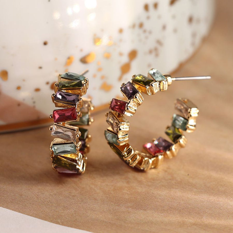 Golden staggered multicoloured crystal hoop earrings