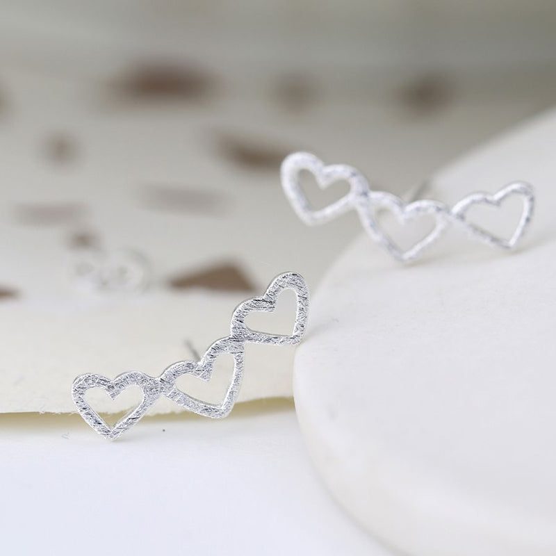 Sterling silver triple scratched heart earrings