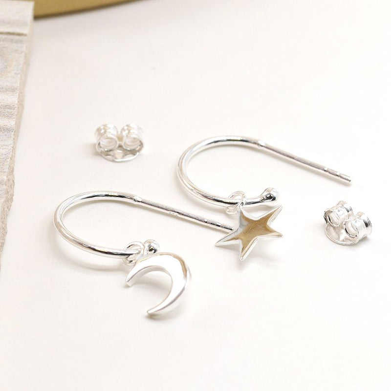 Sterling silver half hoop moon/star earrings
