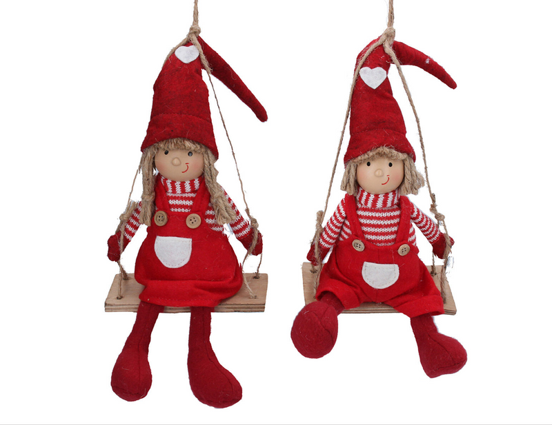 Red Fabric Nordic Girl or Boy with Knitted Hat on Swing