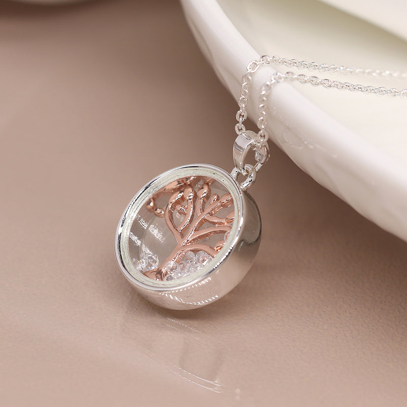 Circle frame necklace with rose gold tree and crystals