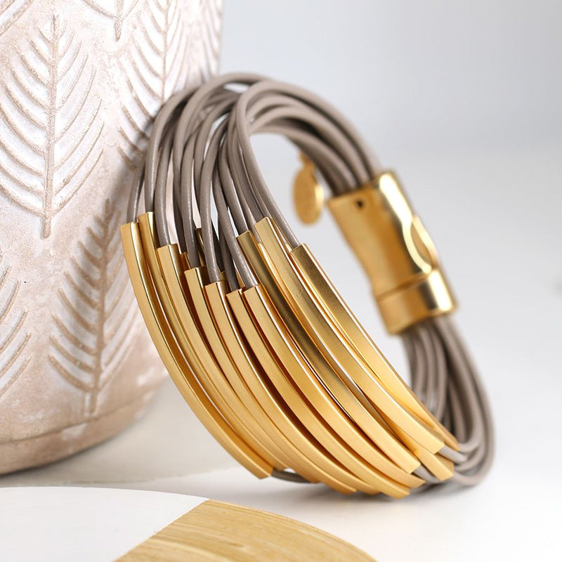 Taupe multi strand and golden bars bracelet