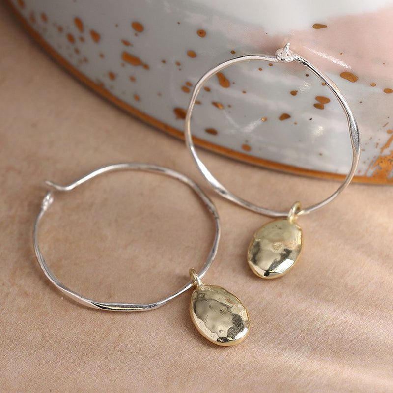 Silver plated beaten hoop earrings with matt gold drops