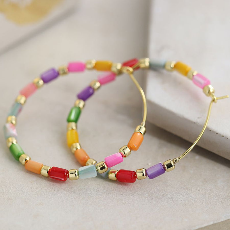 Rainbow shell and golden hoop earrings