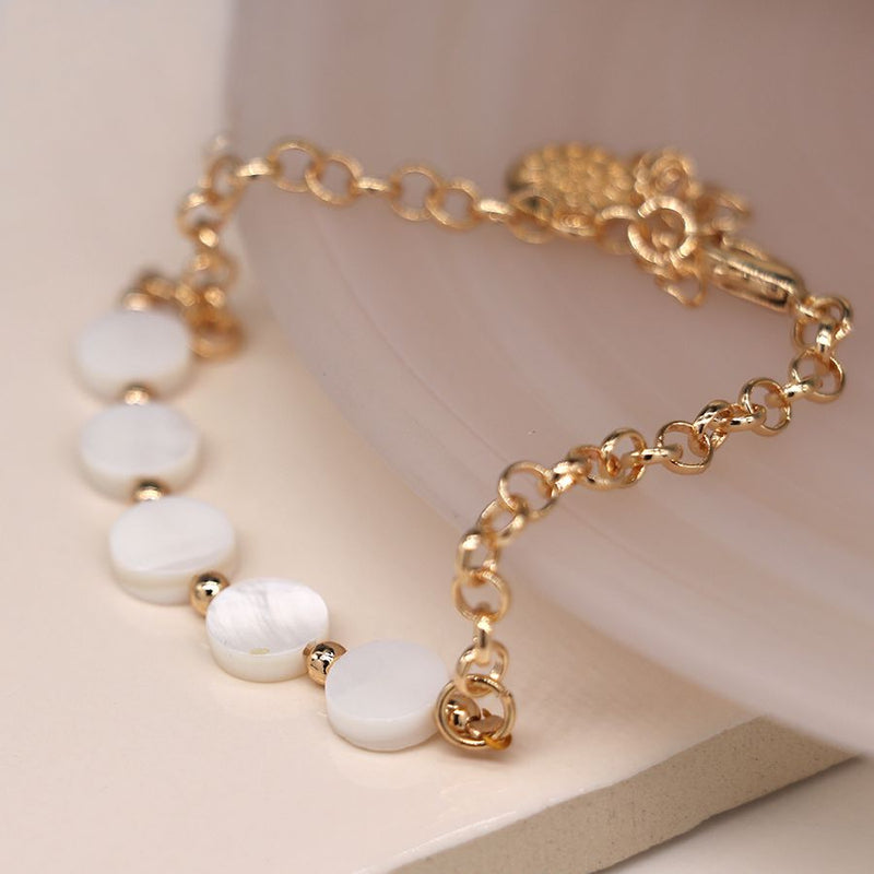 Golden chain and pearl discs bracelet
