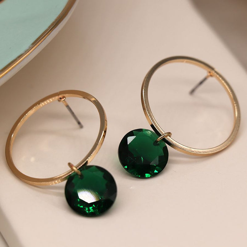 Golden circle stud earrings with green crystal drop