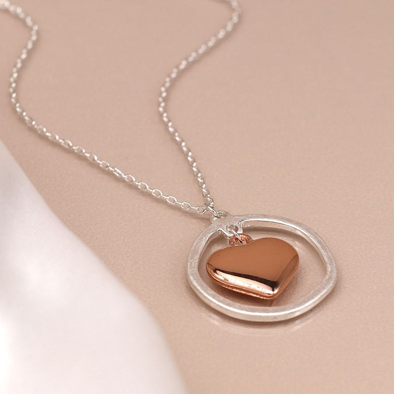 Silver plated worn hoop and rose gold heart necklace