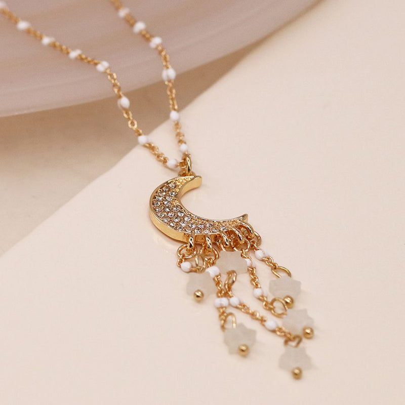 Faux gold plated crystal moon and star drop necklace